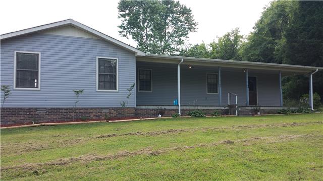 385 Chicken Creek Road Pulaski, TN 38478 - Photo 14 of 15 a backyard of a house with lots of green space