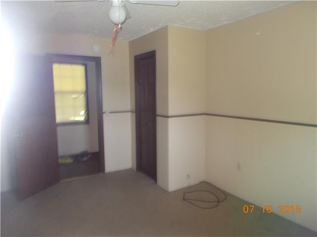 385 Chicken Creek Road Pulaski, TN 38478 - Photo 4 of 15 a view of an empty room with a window