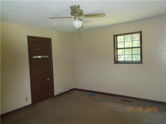 385 Chicken Creek Road Pulaski, TN 38478 - Photo 8 of 15 an empty room with a window