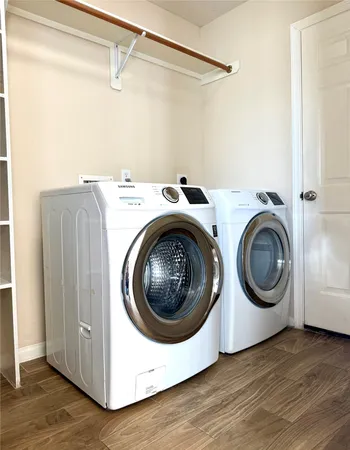a utility room with dryer and washer
