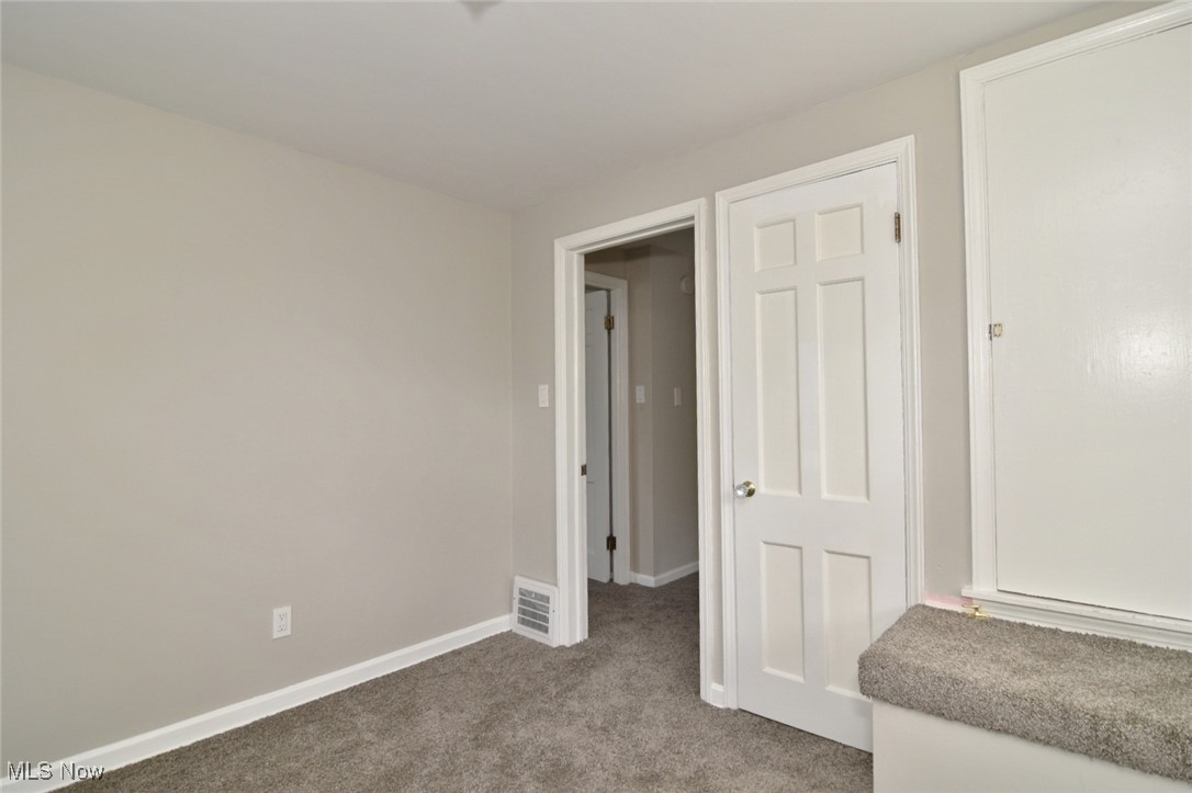 1443 Churchill Road Lyndhurst, OH 44124 - Photo 31 of 39 Unfurnished bedroom with carpet and baseboards