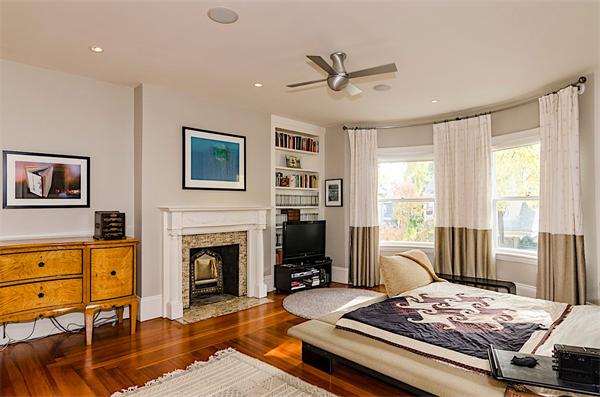 33 Manchester Road Brookline, MA 02446 - Photo 13 of 23 a living room with furniture and a fireplace