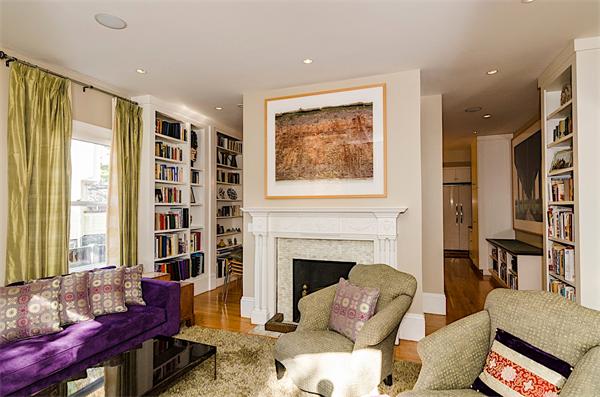 33 Manchester Road Brookline, MA 02446 - Photo 7 of 23 a living room with furniture and a fireplace