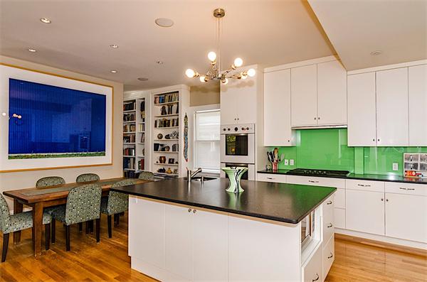 33 Manchester Road Brookline, MA 02446 - Photo 10 of 23 a kitchen with kitchen island granite countertop a sink and counter space
