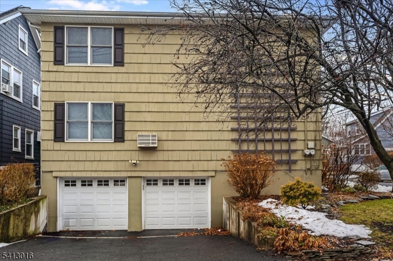 35 Field Road, Unit 2 Maplewood, NJ 07040 - Photo 13 of 13 a front view of a house with parking