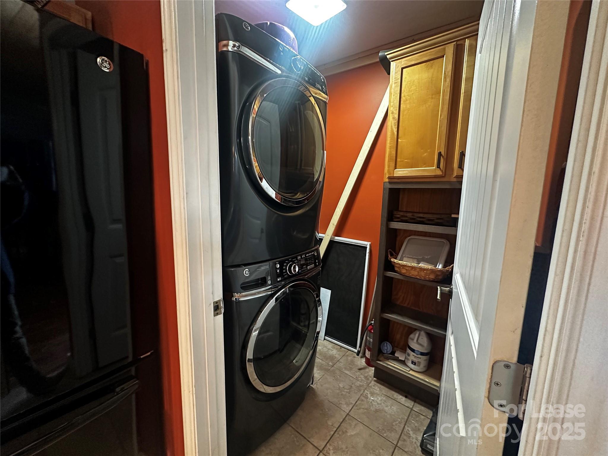 717 Deep Gap Road Burnsville, NC 28714 - Photo 8 of 23 a close view of a utility room with dryer and washer