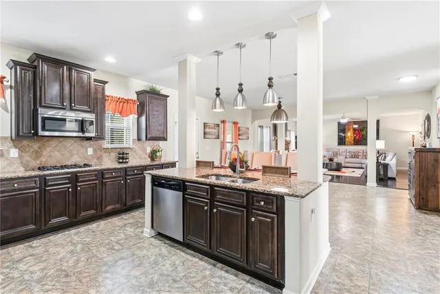 a living room with furniture fireplace and a flat screen tv