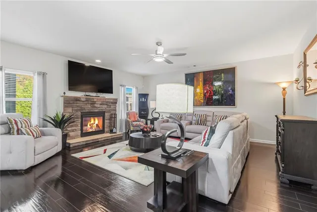 a bedroom with a bed and dresser with mirror