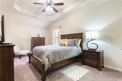 a living room with furniture and a area