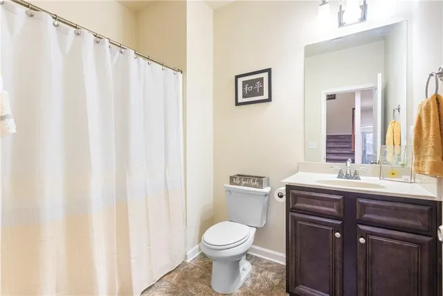 a view of a bathroom with a glass shower door
