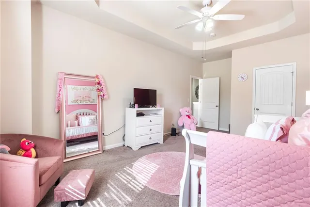 a bathroom with a bathtub a sink and a window