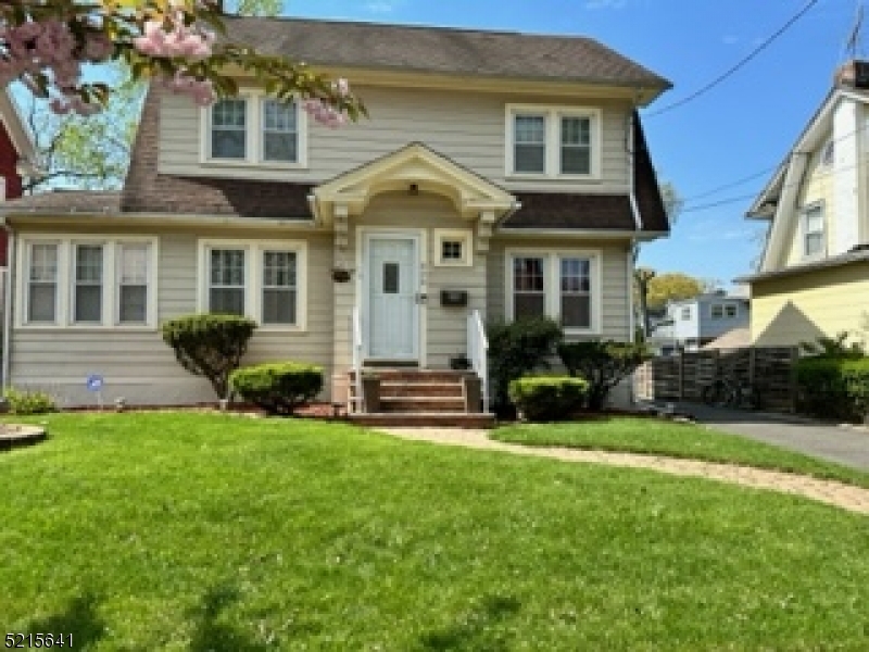 820 Central Street Plainfield, NJ 07062 - Photo 1 of 23 a view of a house with a yard and plants