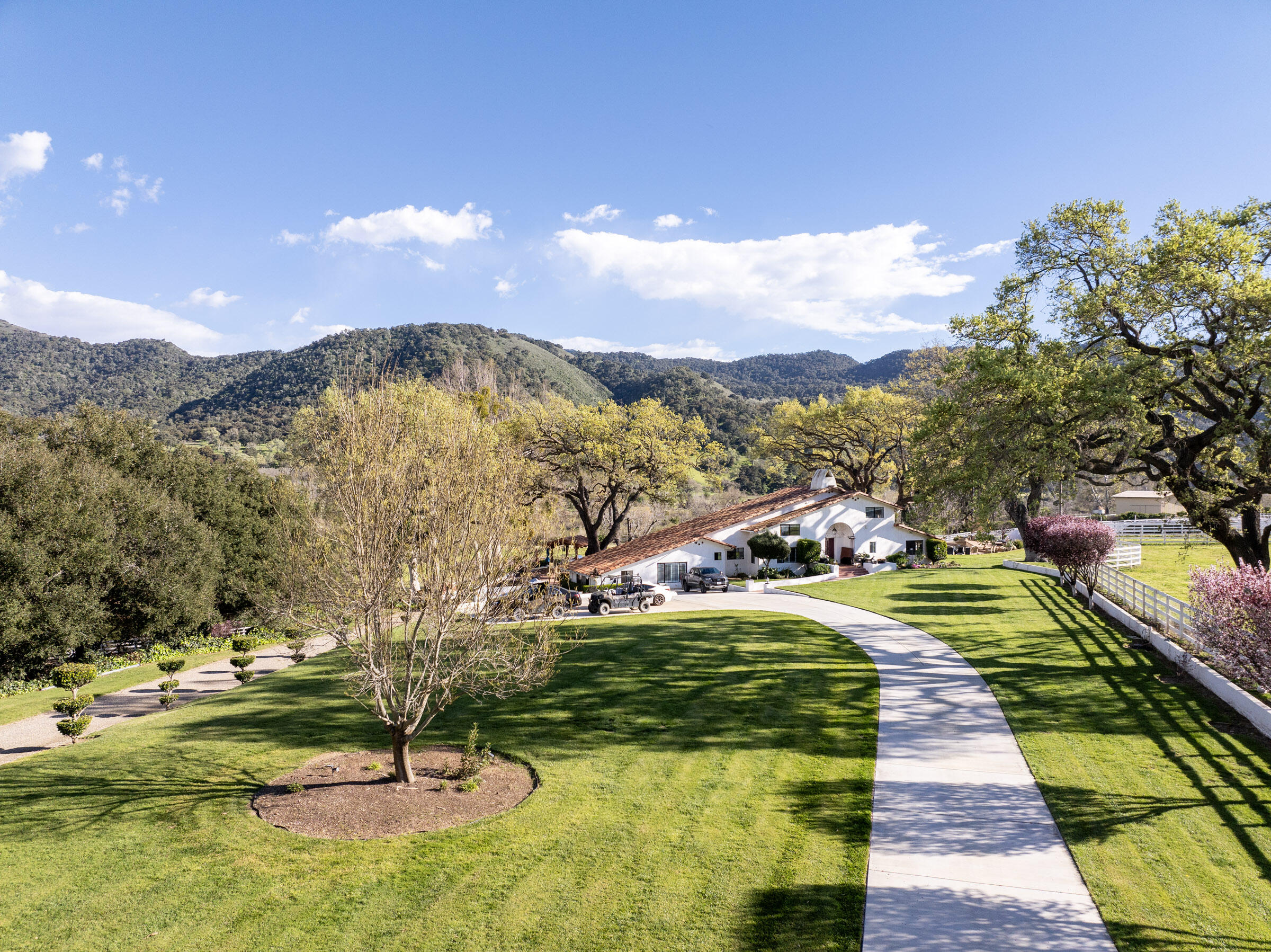 120 Meadowlark Road Santa Ynez, CA 93460 - Photo 2 of 42 a view of a lake with a mountain in the background