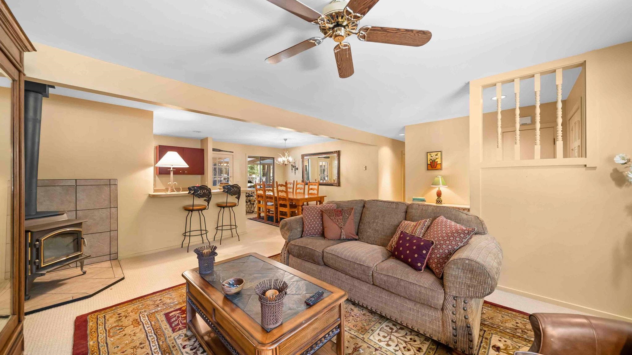 11 Shasta Trail Graeagle, CA 96103 - Photo 5 of 28 a living room with furniture and a fireplace