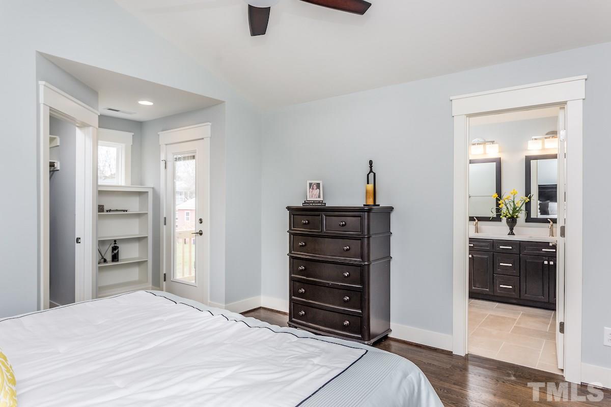 830 Coleman Street Raleigh, NC 27610 - Photo 16 of 24 a bedroom with a bed and a dresser