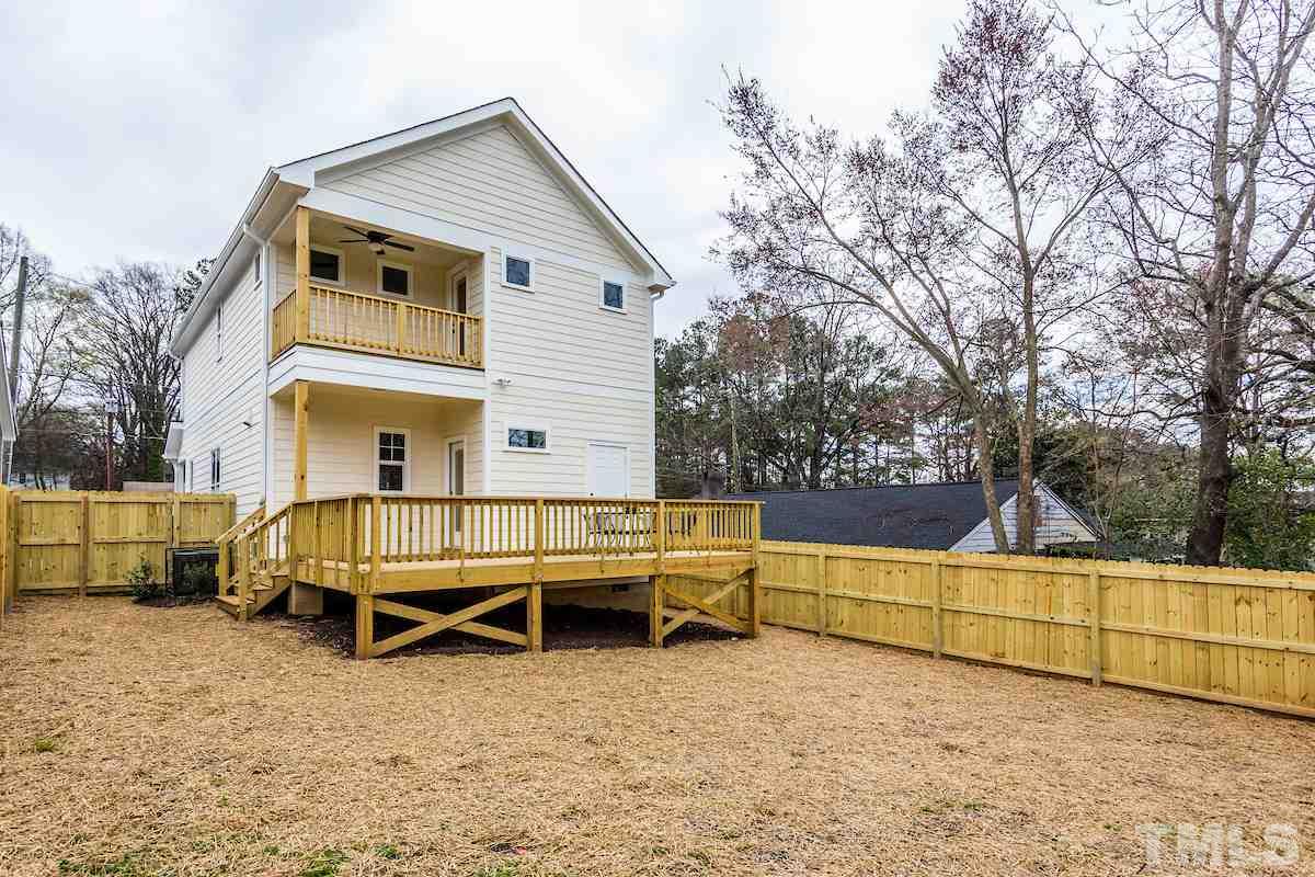 830 Coleman Street Raleigh, NC 27610 - Photo 24 of 24 a view of a house with backyard and sitting area