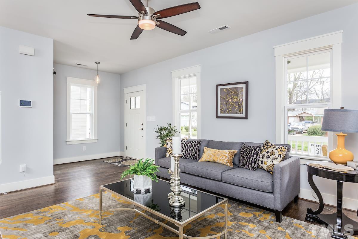 830 Coleman Street Raleigh, NC 27610 - Photo 5 of 24 a living room with furniture and a window