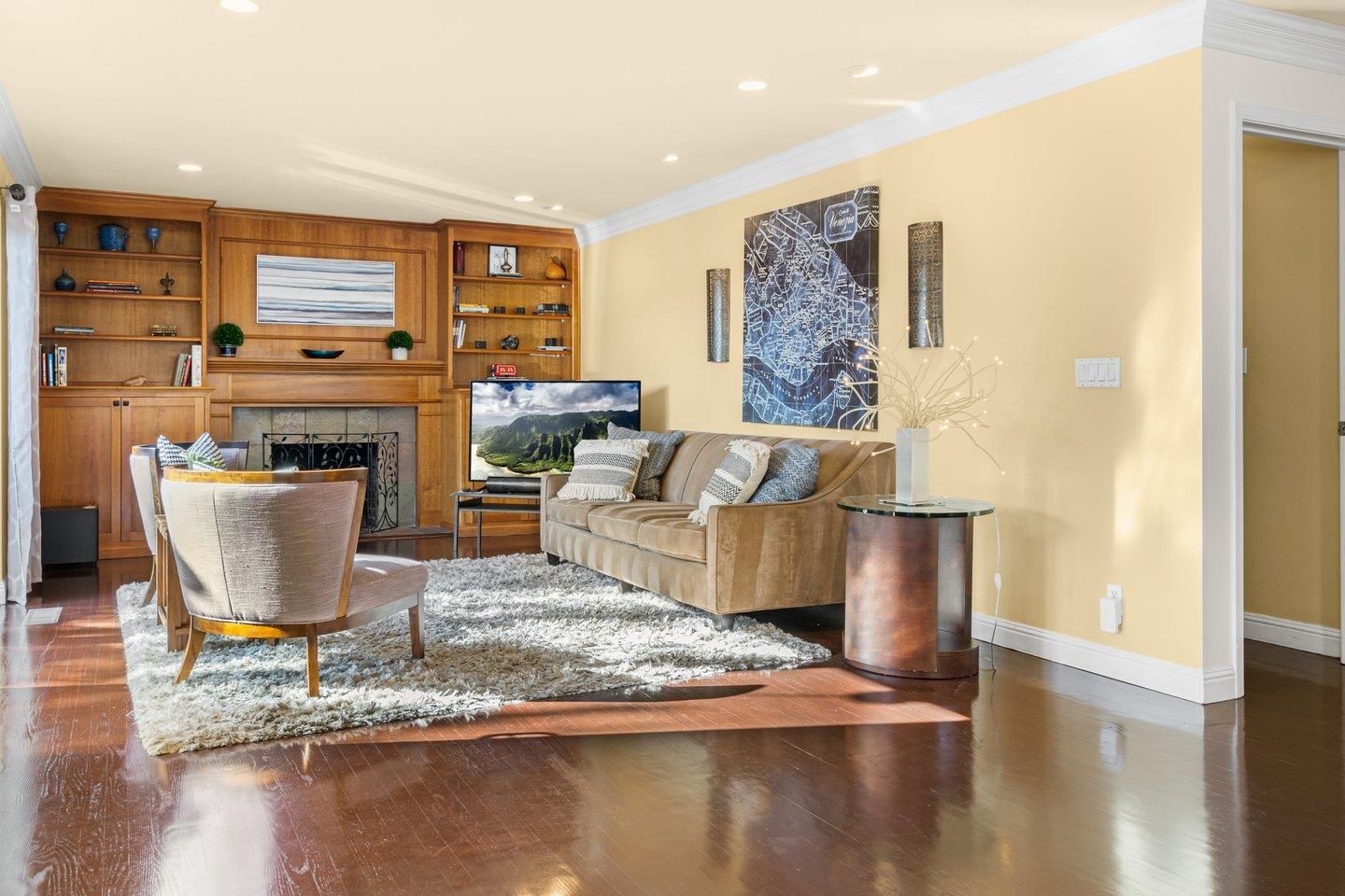 2248 Montezuma Drive Campbell, CA 95008 - Photo 13 of 36 a living room with fireplace furniture and a wooden floor
