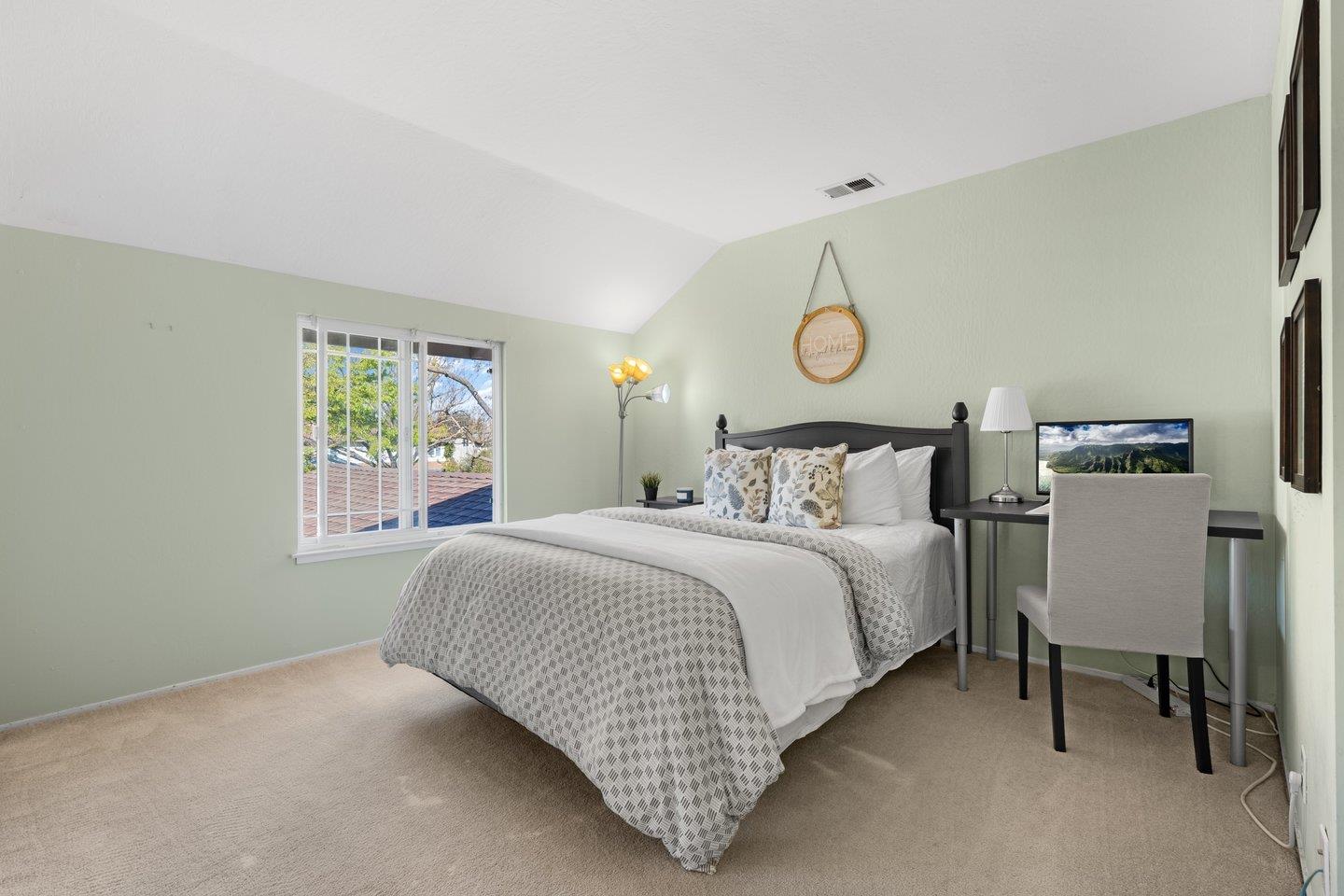 2248 Montezuma Drive Campbell, CA 95008 - Photo 18 of 36 a bedroom with a bed and a window