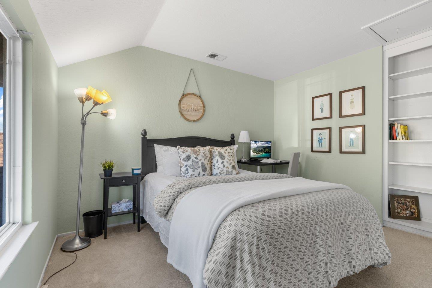 2248 Montezuma Drive Campbell, CA 95008 - Photo 19 of 36 a bedroom with bed and a window