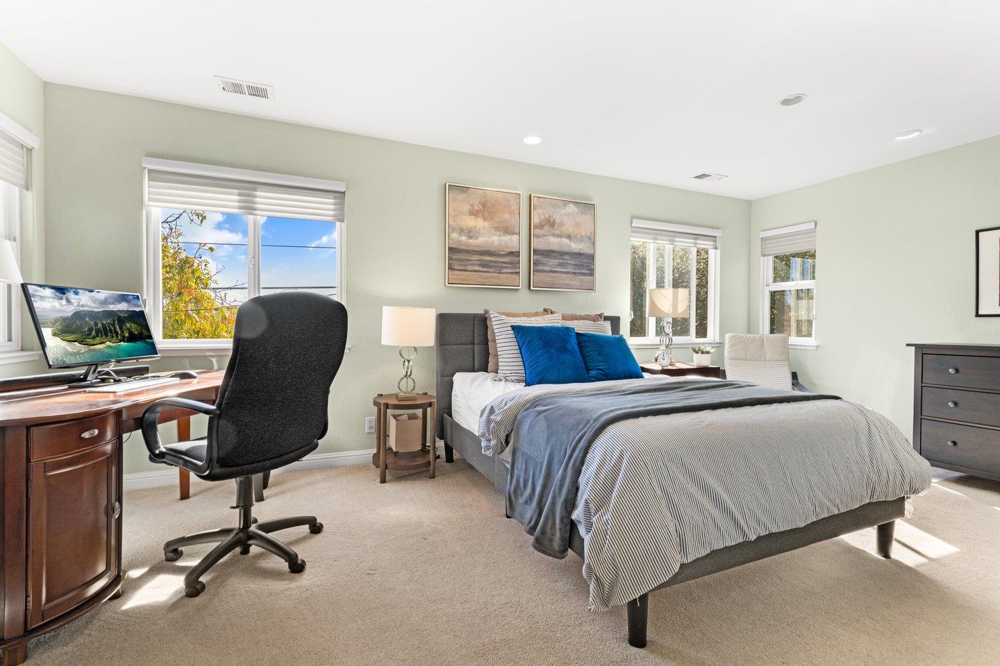 2248 Montezuma Drive Campbell, CA 95008 - Photo 26 of 36 a bedroom with a bed gym equipment and a large window