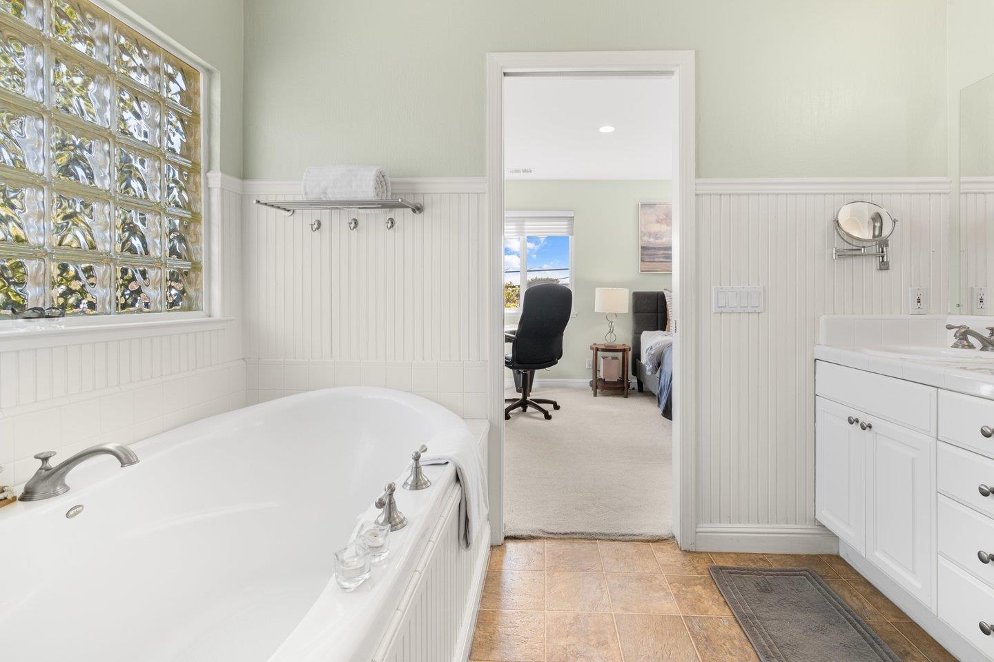 2248 Montezuma Drive Campbell, CA 95008 - Photo 29 of 36 a bathroom with a tub sink and mirror