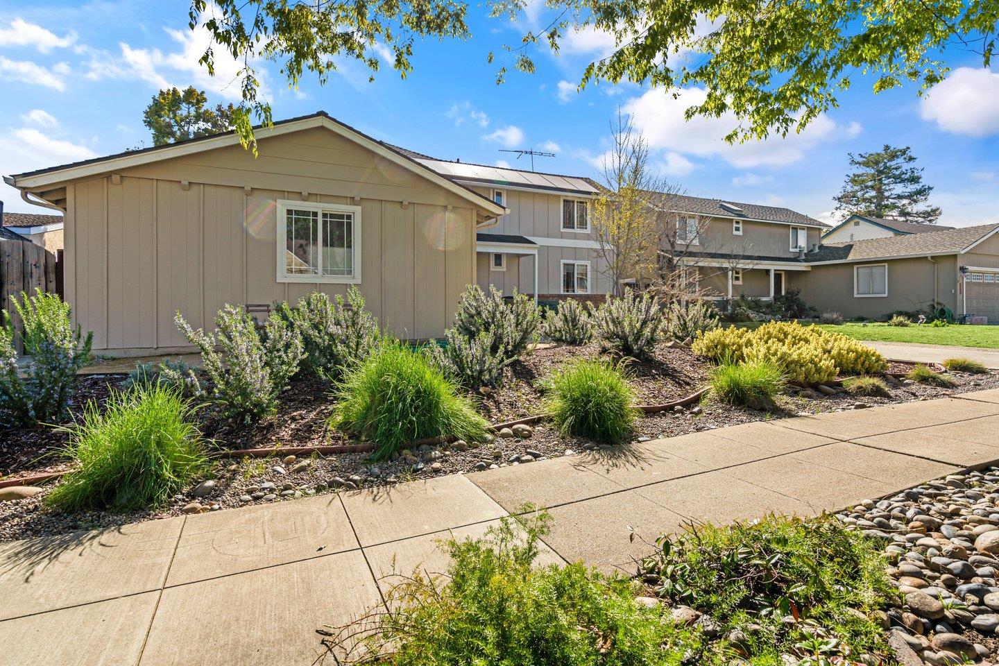 2248 Montezuma Drive Campbell, CA 95008 - Photo 3 of 36 a front view of a house with garden