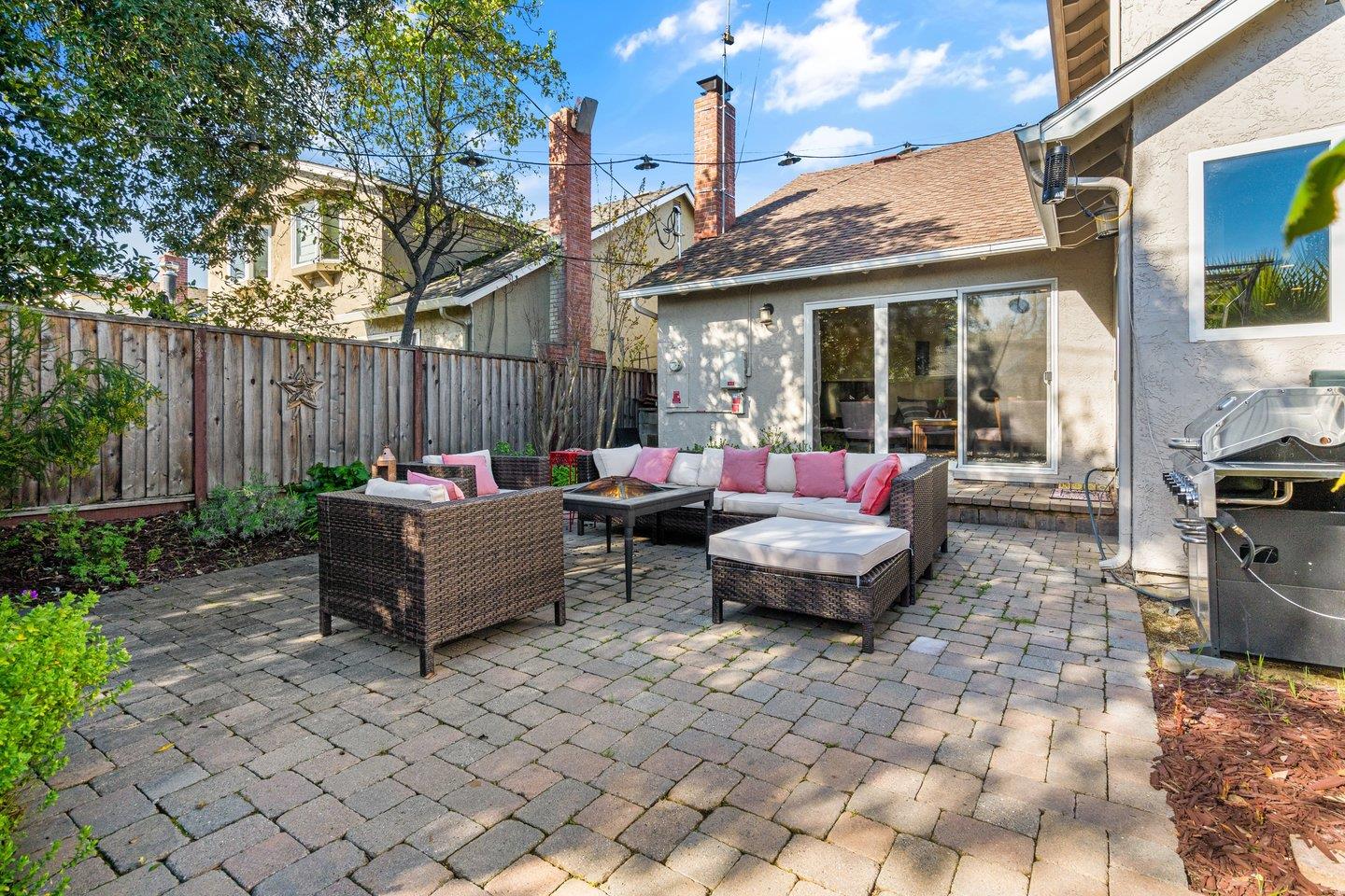 2248 Montezuma Drive Campbell, CA 95008 - Photo 31 of 36 a view of a patio with couches table and chairs and potted plants