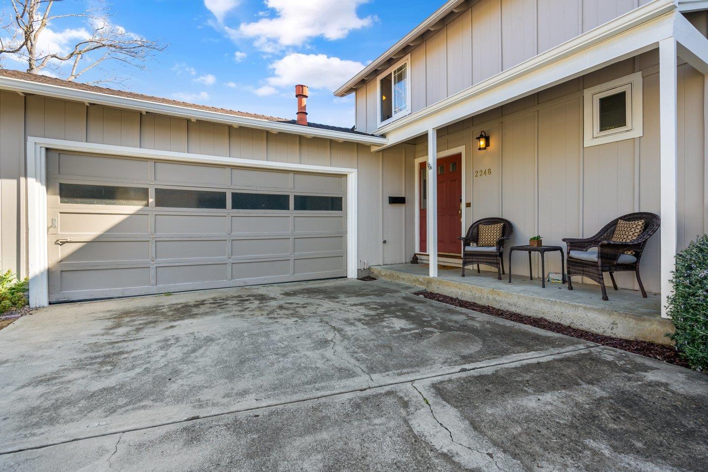 2248 Montezuma Drive Campbell, CA 95008 - Photo 4 of 36 a front view of a house with a yard and seating space