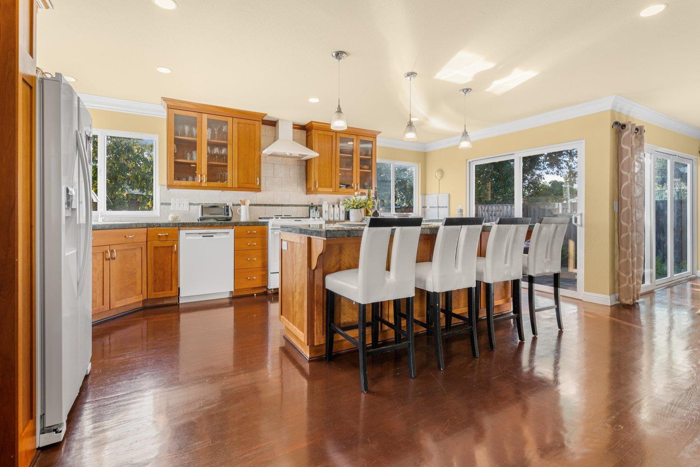 2248 Montezuma Drive Campbell, CA 95008 - Photo 7 of 36 a view of a dining room with furniture and wooden floor