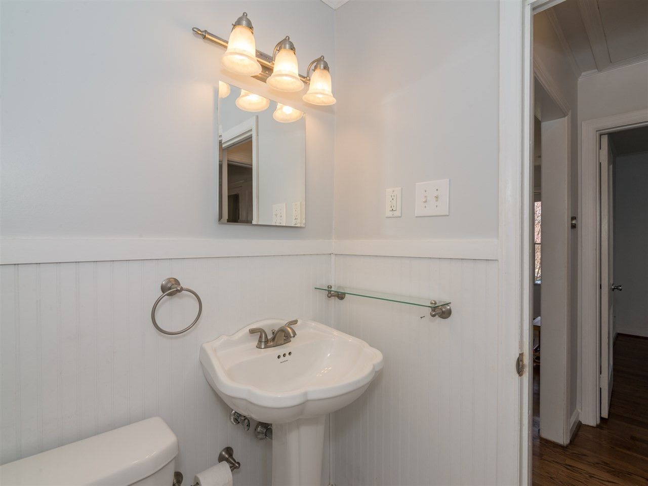 1800 Bennett Street Raleigh, NC 27604 - Photo 9 of 24 Pedestal sink in the bathroom which is adjacent to both the Master and second bedrooms. Bathroom