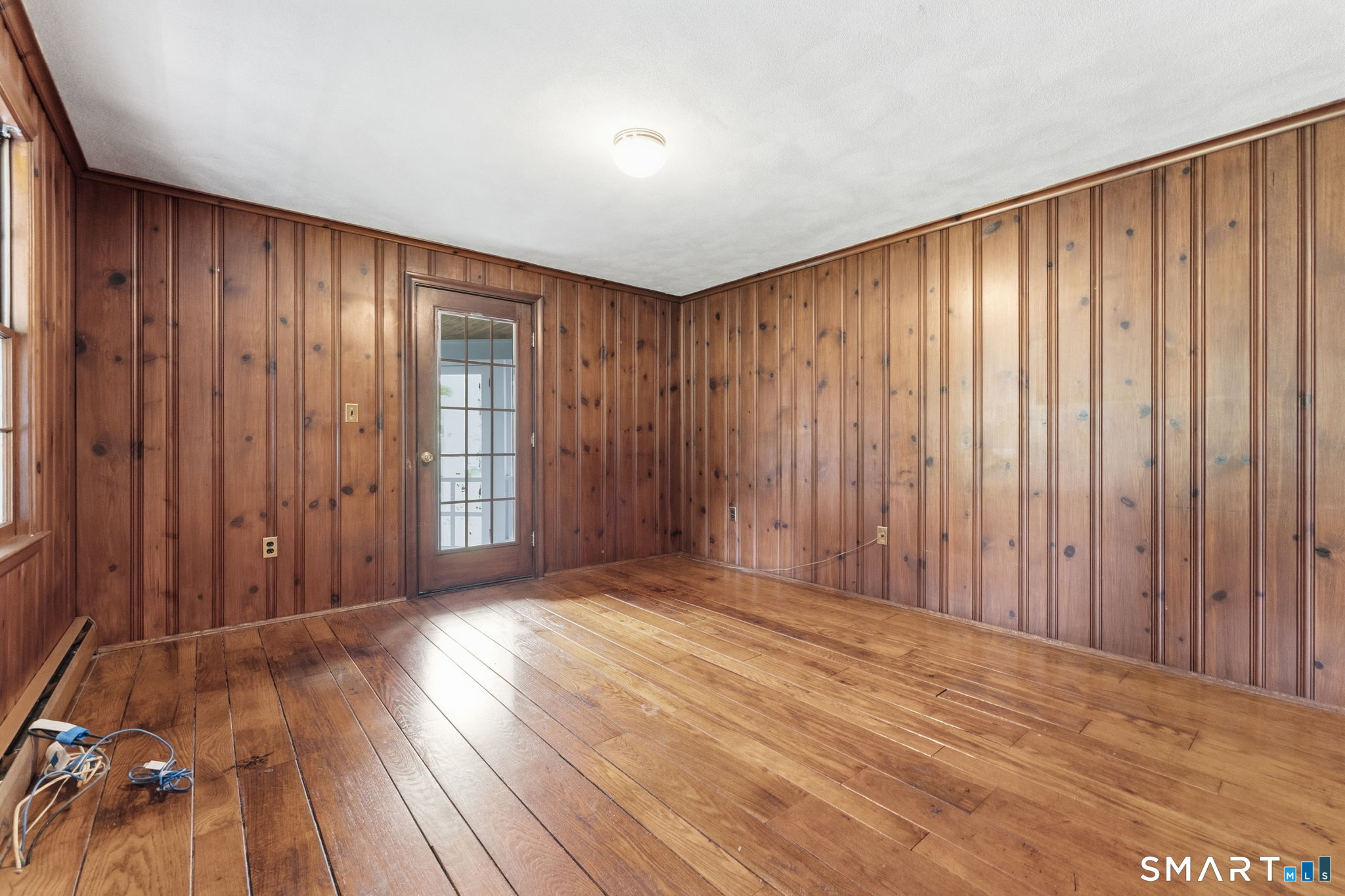 13 Juniper Road Bloomfield, CT 06002 - Photo 26 of 39 First floor study/office or bedroom wiht closet and separate entrance off of screen porch.