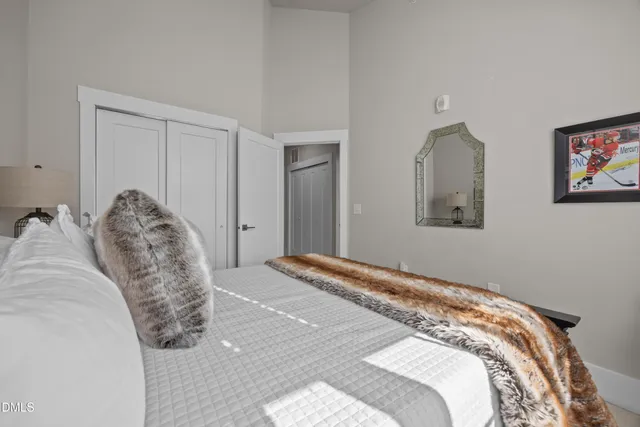 a bathroom with a sink a toilet and shower curtain