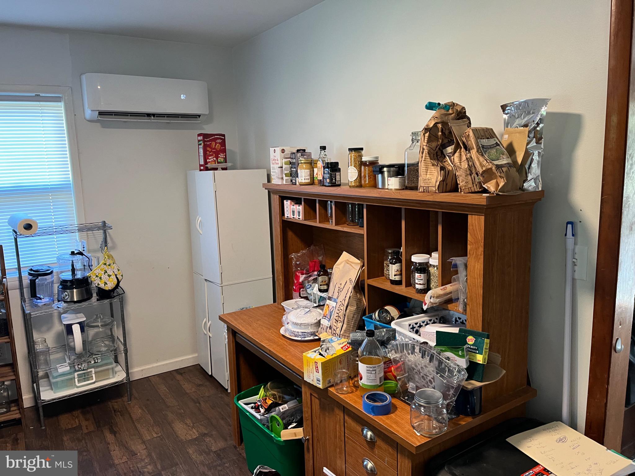 26732 Idlewild Road Federalsburg, MD 21632 - Photo 5 of 15 a living room with furniture and a wooden floor