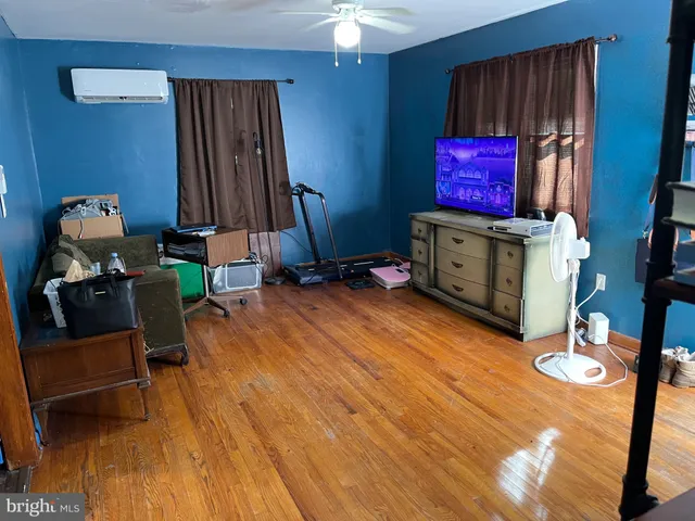 a room with furniture and a mirror