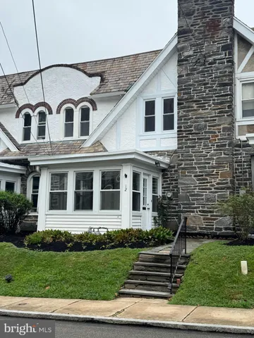 a house view with a garden space