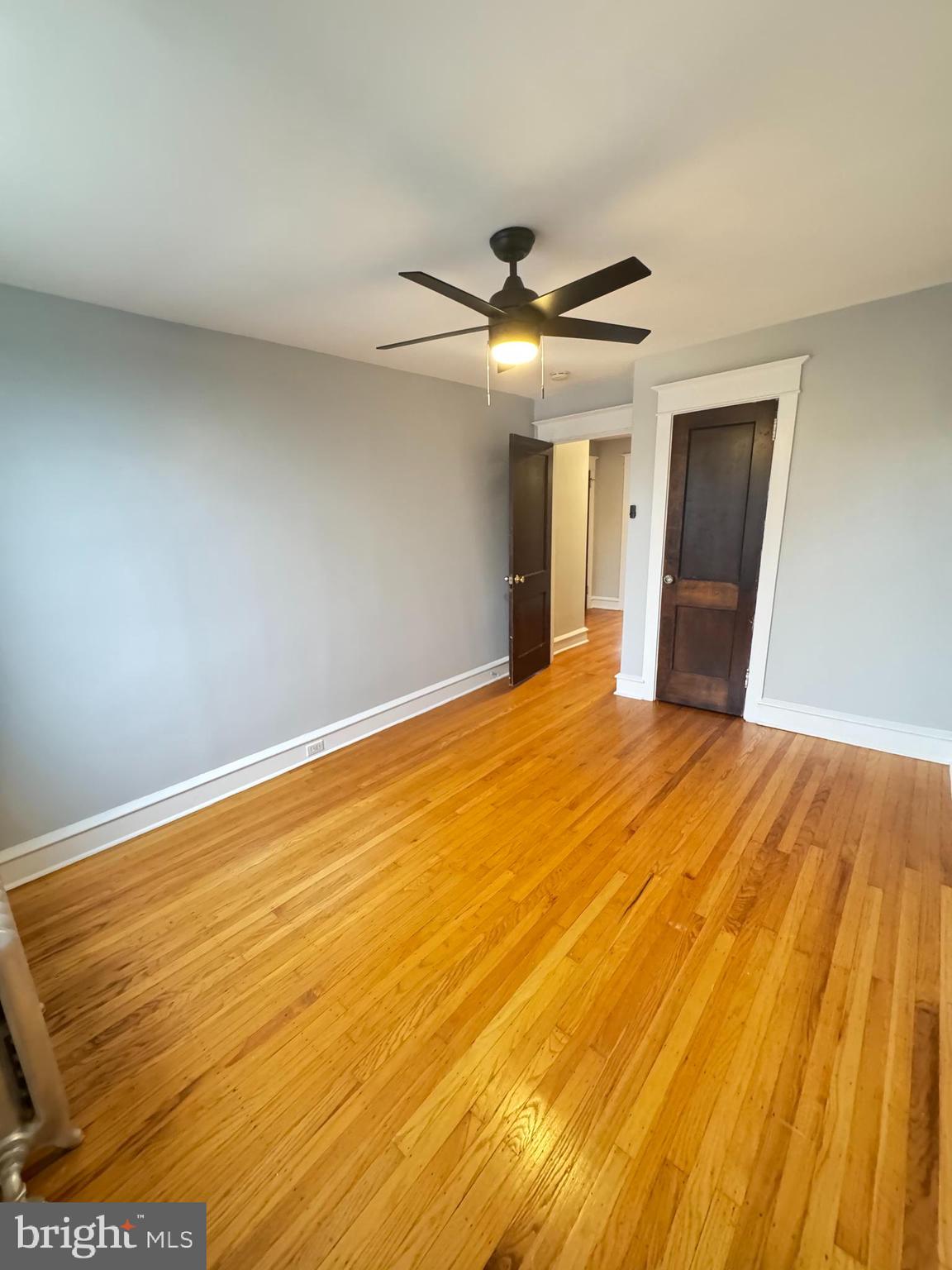 12 West Athens Avenue Ardmore, PA 19003 - Photo 17 of 18 a view of an empty room with wooden floor
