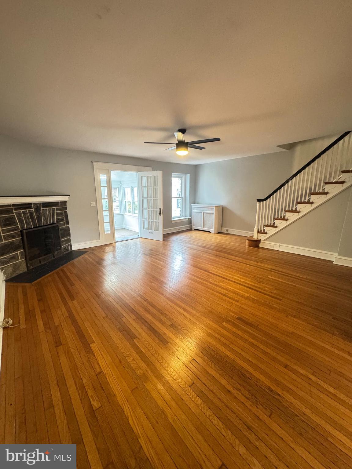 12 West Athens Avenue Ardmore, PA 19003 - Photo 4 of 18 a view of an empty room with a window and wooden floor
