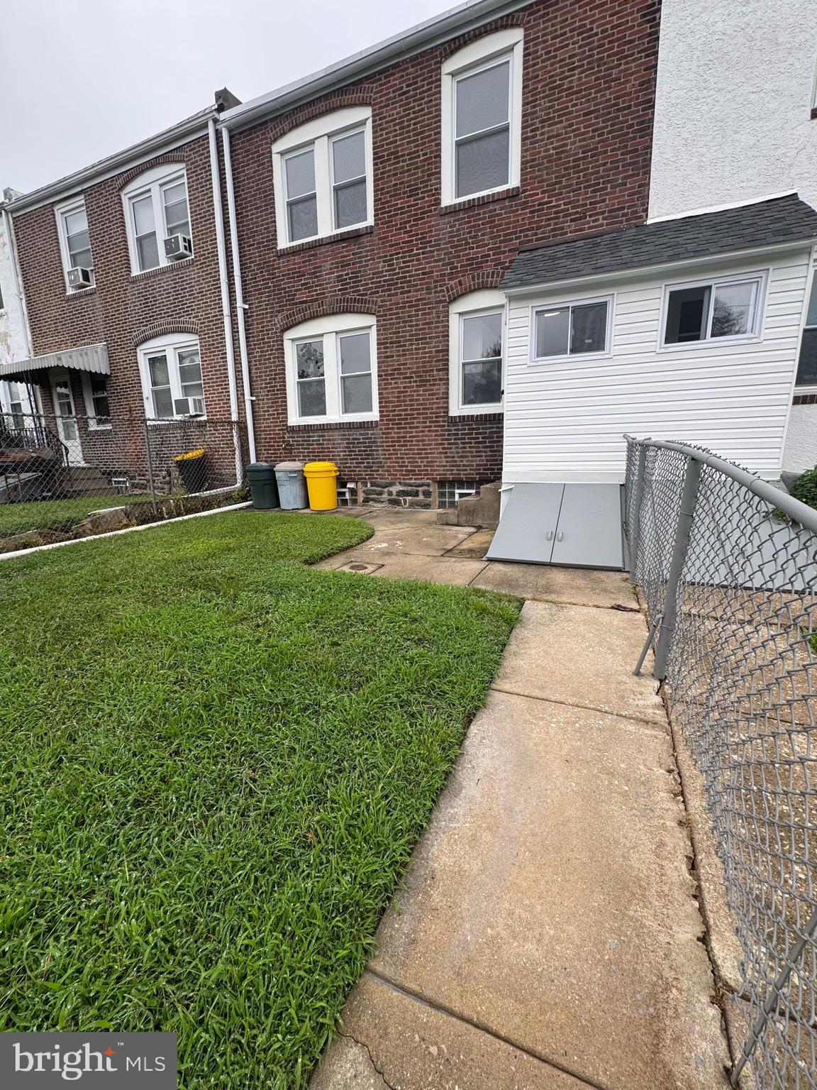 12 West Athens Avenue Ardmore, PA 19003 - Photo 8 of 18 a backyard of a house with barbeque oven and outdoor seating
