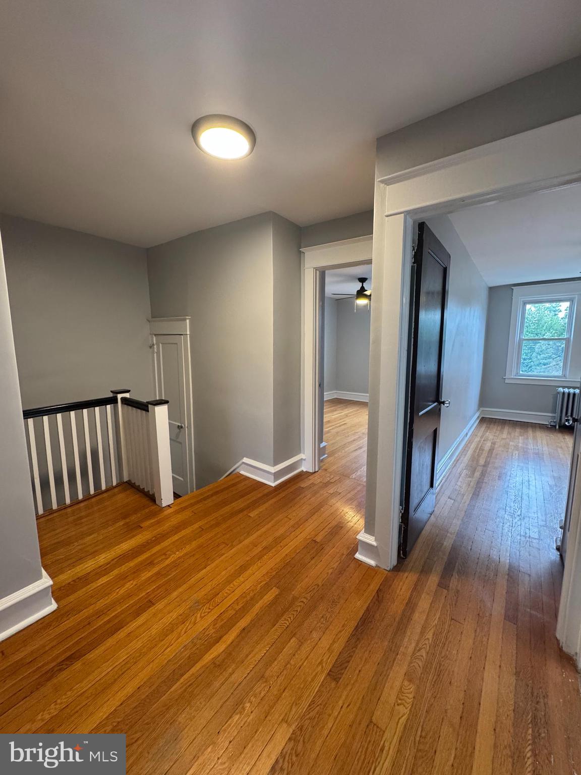 12 West Athens Avenue Ardmore, PA 19003 - Photo 10 of 18 a view of a room with wooden floor and a bathroom