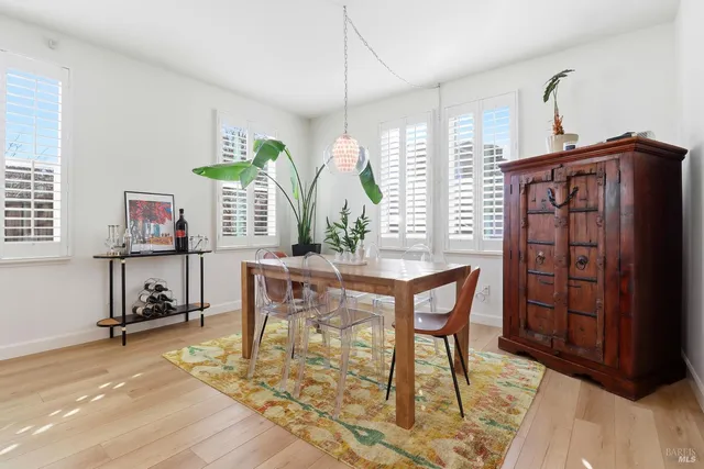 a kitchen with stainless steel appliances granite countertop a stove top oven a sink dishwasher and microwave oven