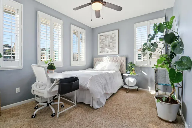 a view of a workspace with furniture