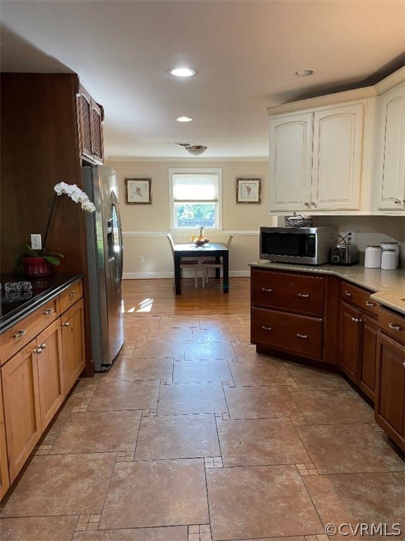 9201 Winterpock Road Chesterfield, VA 23832 - Photo 13 of 28 a kitchen with stainless steel appliances a refrigerator and a stove