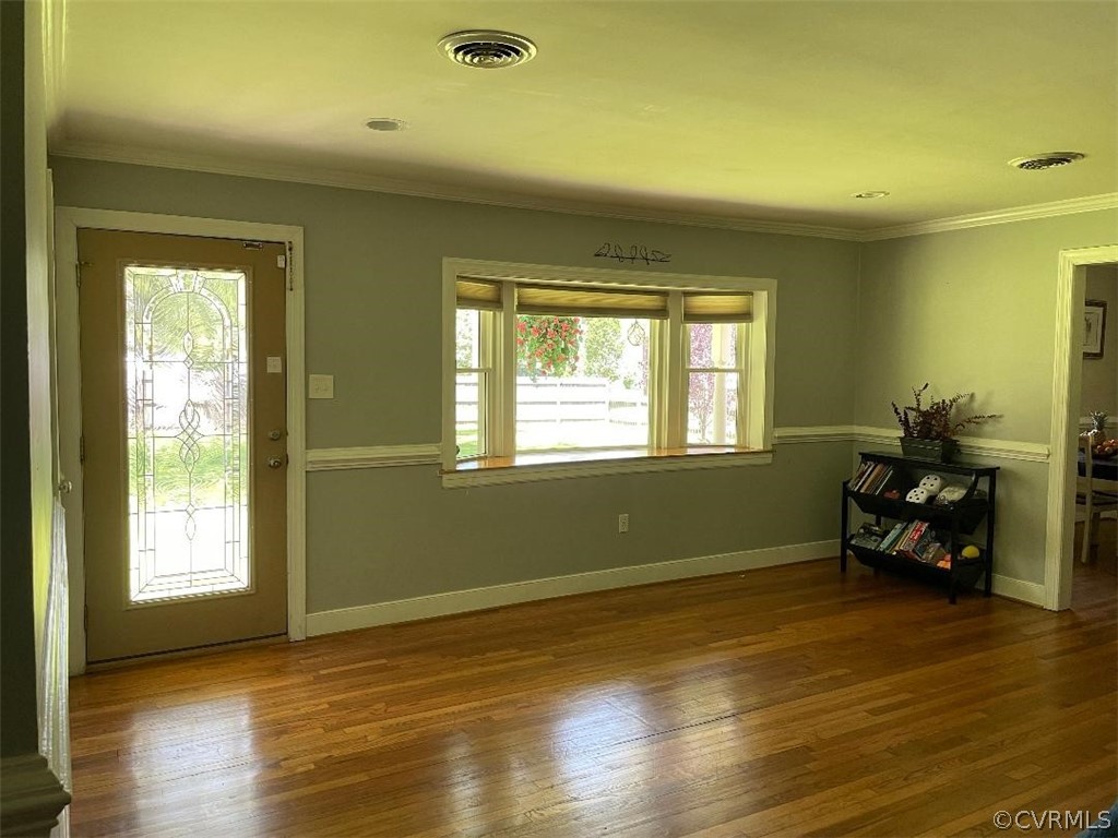 9201 Winterpock Road Chesterfield, VA 23832 - Photo 16 of 28 a view of a room with wooden floor and furniture