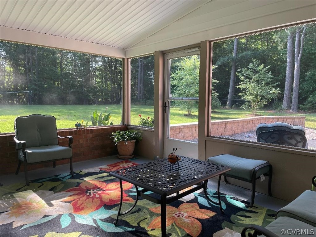 9201 Winterpock Road Chesterfield, VA 23832 - Photo 10 of 28 a living room with furniture and a floor to ceiling window