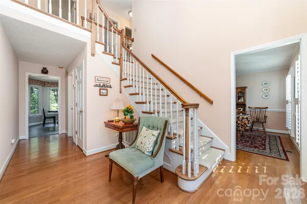 a view of entryway livingroom and hall