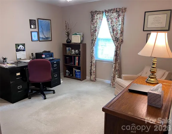 a room with furniture and window