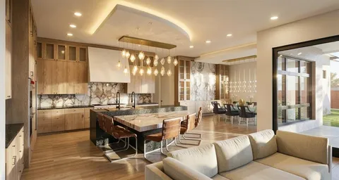 a large dining space with furniture and a large window