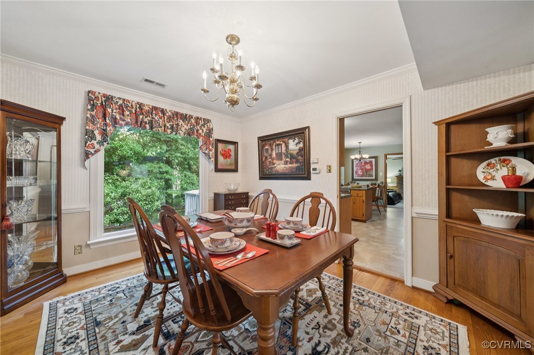 3000 Cove Ridge Road Midlothian, VA 23112 - Photo 11 of 47 a view of a dining room with furniture window and wooden floor