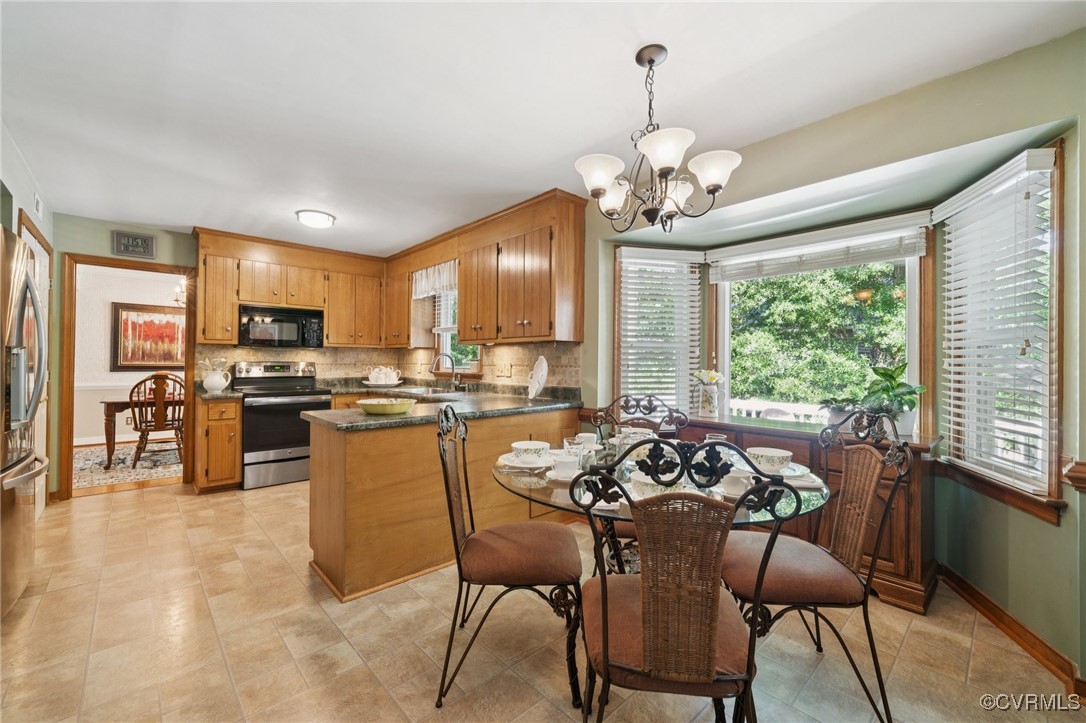 3000 Cove Ridge Road Midlothian, VA 23112 - Photo 21 of 47 a view of a dining room with furniture window and outside view